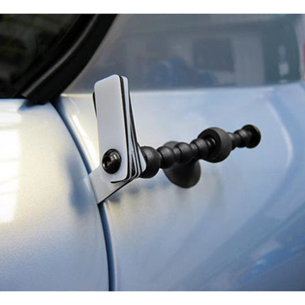 panel gap gauge being used on a vehicle body to measure the gaps between the panels.